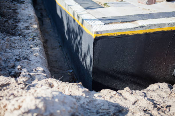 Professional Waterproofing technician working in Montclair, NJ